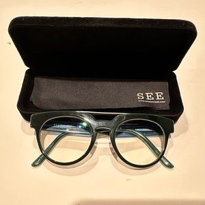 Eyeglasses w/polished metal brow bar retail